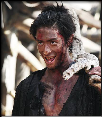 Yūsuke Iseya, as Kiga Koyata (the slingshot-wielding, stringily-indestructible mountain-man), in Miike Takashi's 13 ASSASSINS.