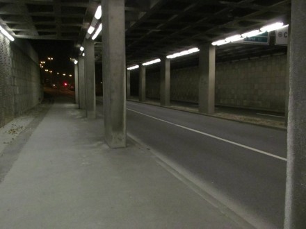 ... and in the darkened underpass ...